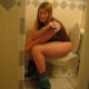 A girl is video-recorded as she tries to shit while others laugh nearby. No pooping sounds, but the girl has a nice, pudgy bottom.